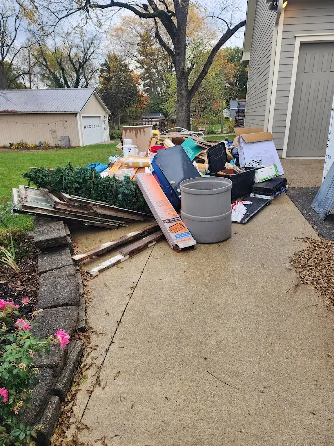 Dumpster being loaded with debris for Demolition Dumpster Rental in North Sewickley
